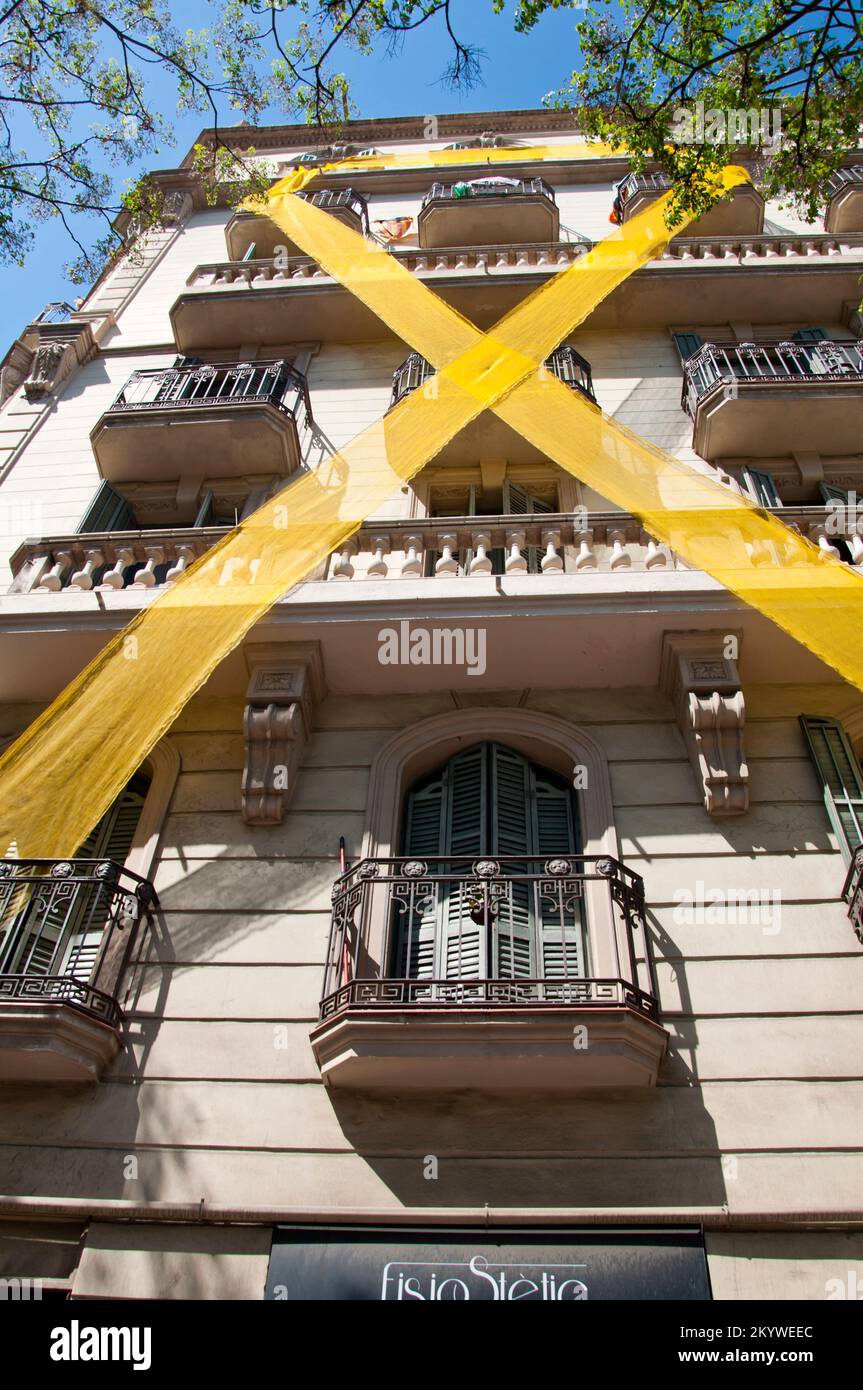 Big yellow ribbon, symbol of catalan separatist vindication, hanging on
