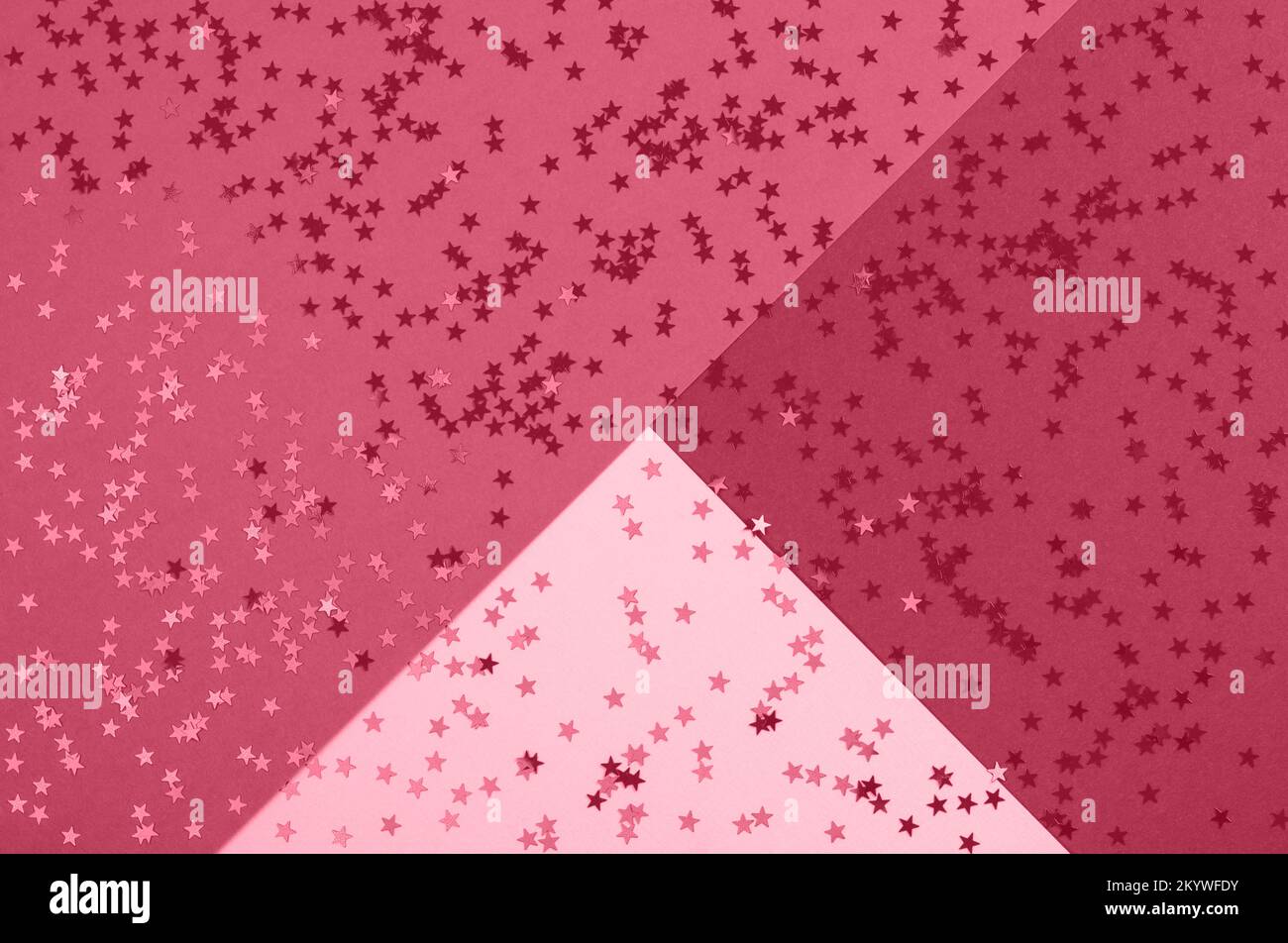 Beautiful festive abstract magenta background with metallic star shaped