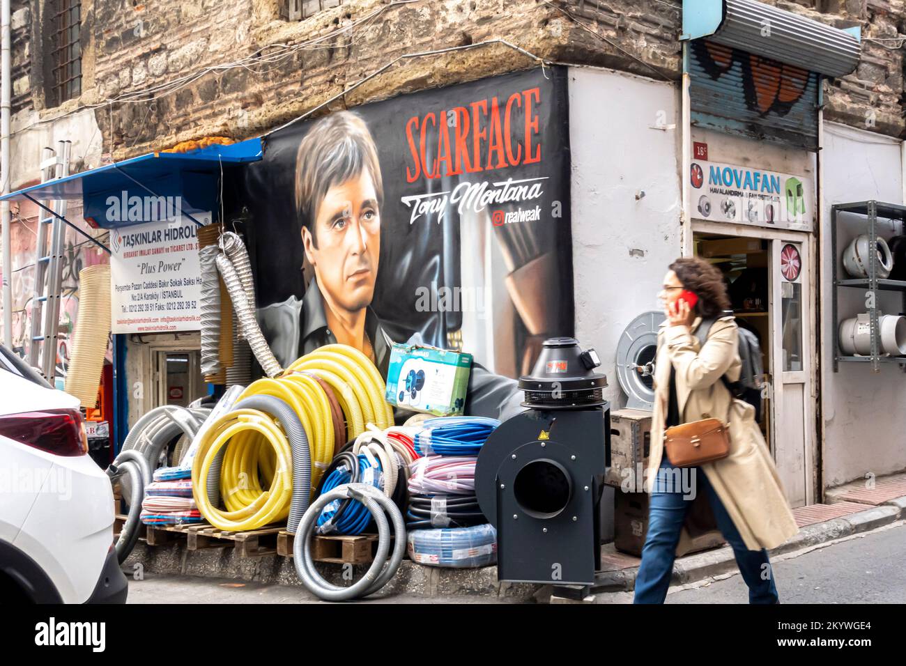 Scarface Al Pacino Tony Montana mural on the wall of power supplies equipment shop in Karakoy Istanbul Turkey Stock Photo