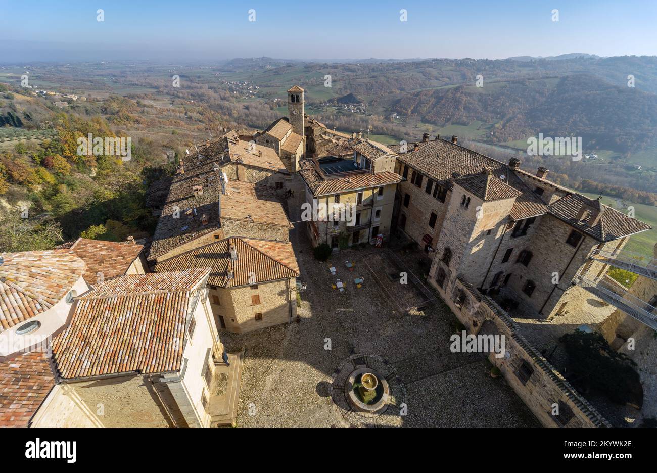 The medieval village and castle of Vigoleno in the Apennines in the province of Piacenza, Emilia Romagna, Northern Italy - aerial view Stock Photo