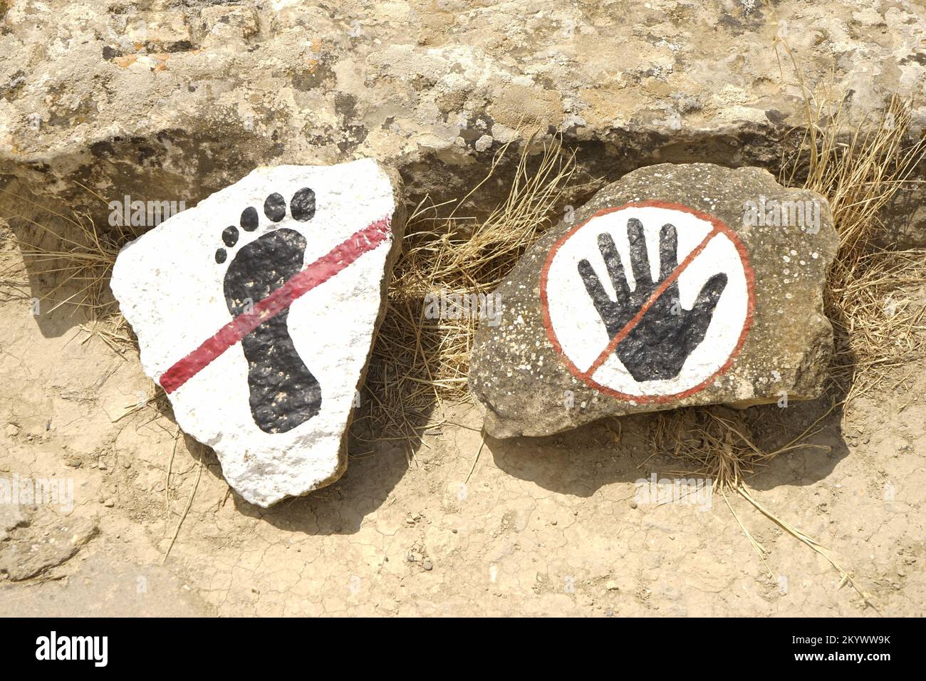 Touch Rocks The signs and goes to touch the forbidden painted on the rocks Stock ...