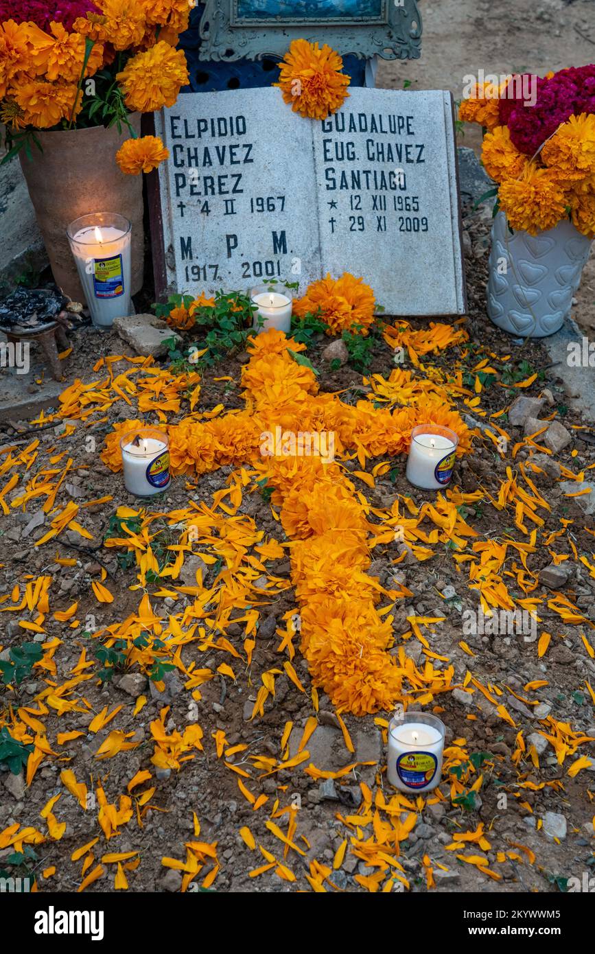 A grave in the Xochimilco Cemetery decorated for the Day of the Dead or Dia de los Muertos in Oaxaca, Mexico. Stock Photo