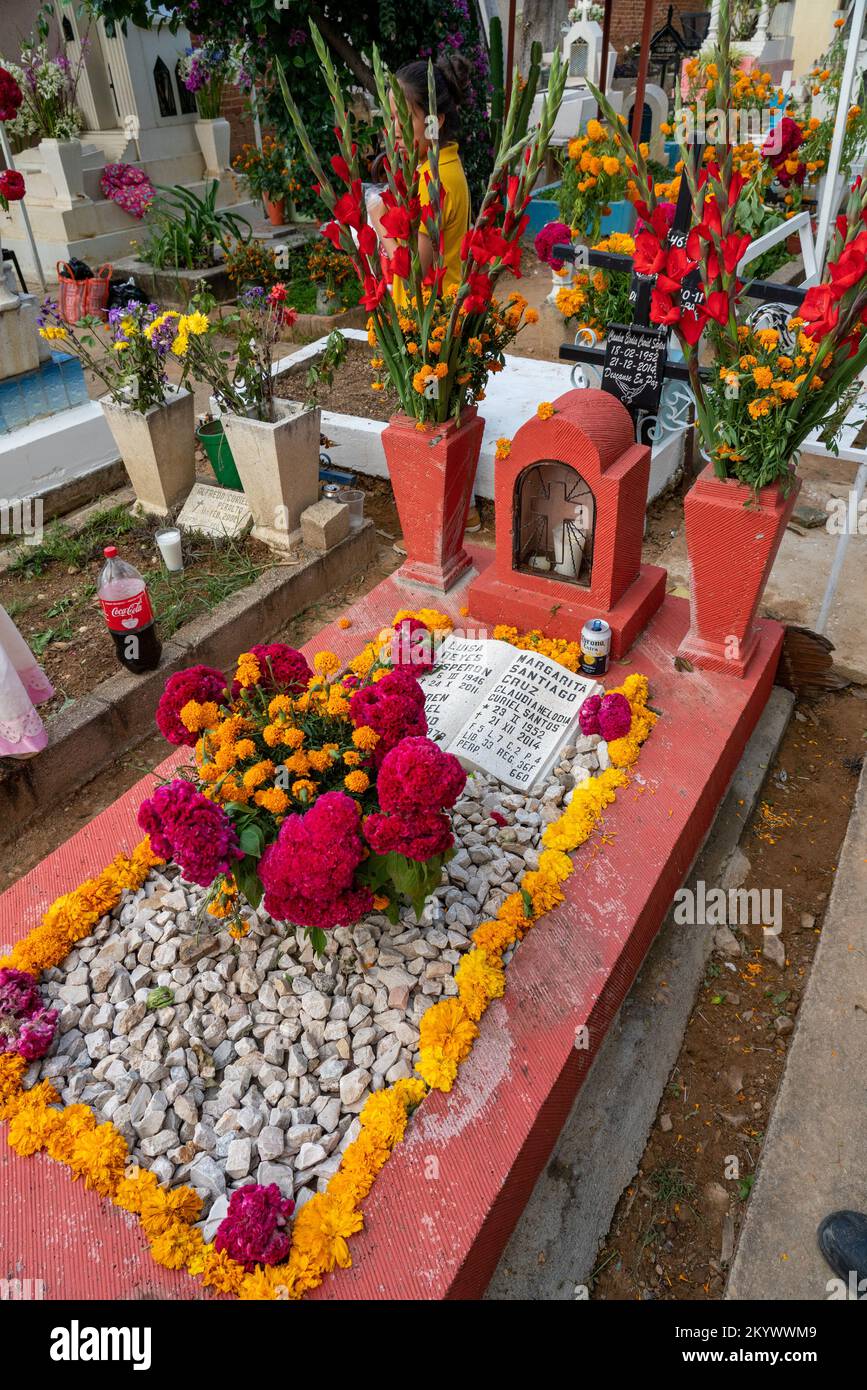 A grave in the Xochimilco Cemetery decorated for the Day of the Dead or Dia de los Muertos in Oaxaca, Mexico. Stock Photo