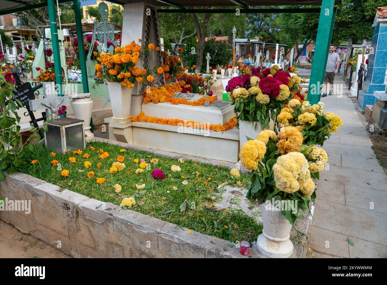 A grave in the Xochimilco Cemetery decorated for the Day of the Dead or Dia de los Muertos in Oaxaca, Mexico. Stock Photo