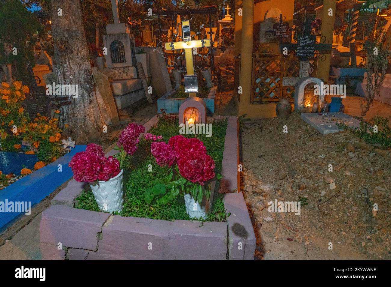 A grave in the Xochimilco Cemetery decorated for the Day of the Dead or Dia de los Muertos in Oaxaca, Mexico. Stock Photo