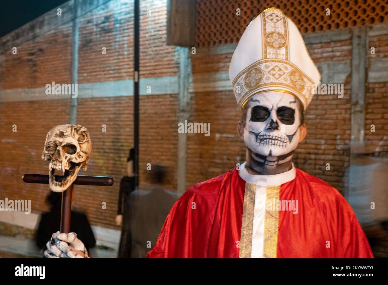 a-man-dressed-as-an-archbishop-for-the-day-of-the-dead-celebration-in