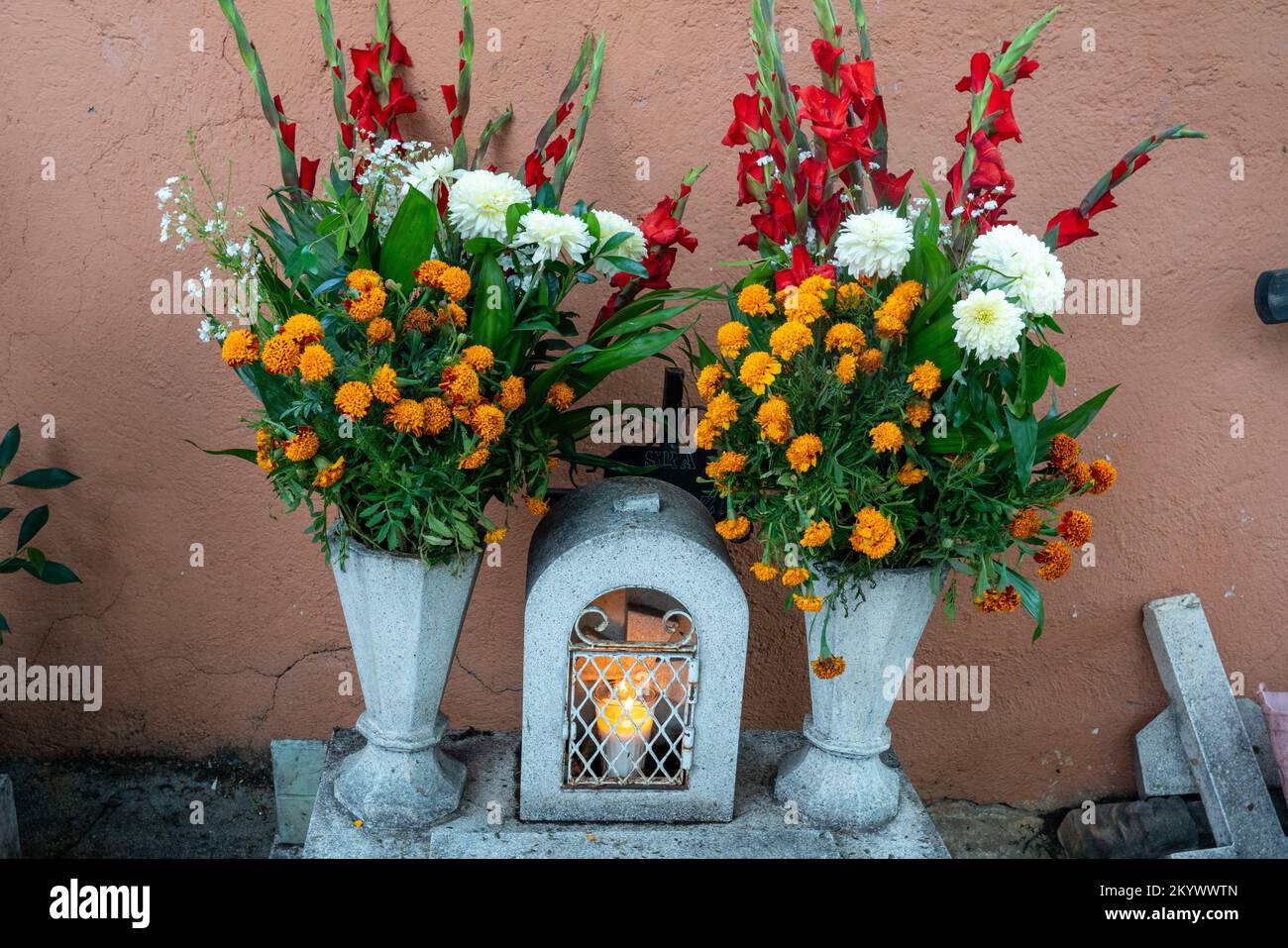 A grave in the Xochimilco Cemetery decorated for the Day of the Dead or Dia de los Muertos in Oaxaca, Mexico. Stock Photo