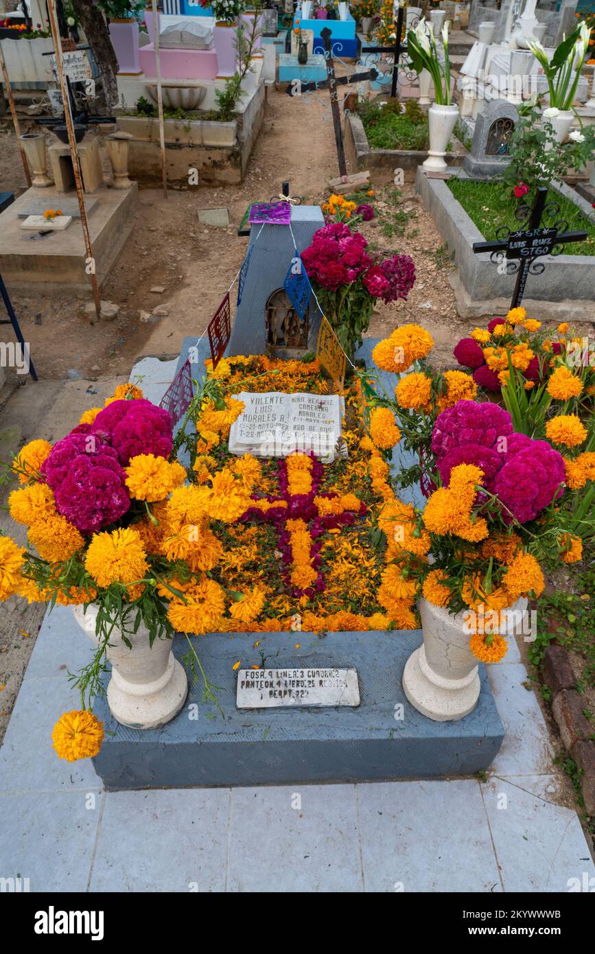 A grave in the Xochimilco Cemetery decorated for the Day of the Dead or Dia de los Muertos in Oaxaca, Mexico. Stock Photo