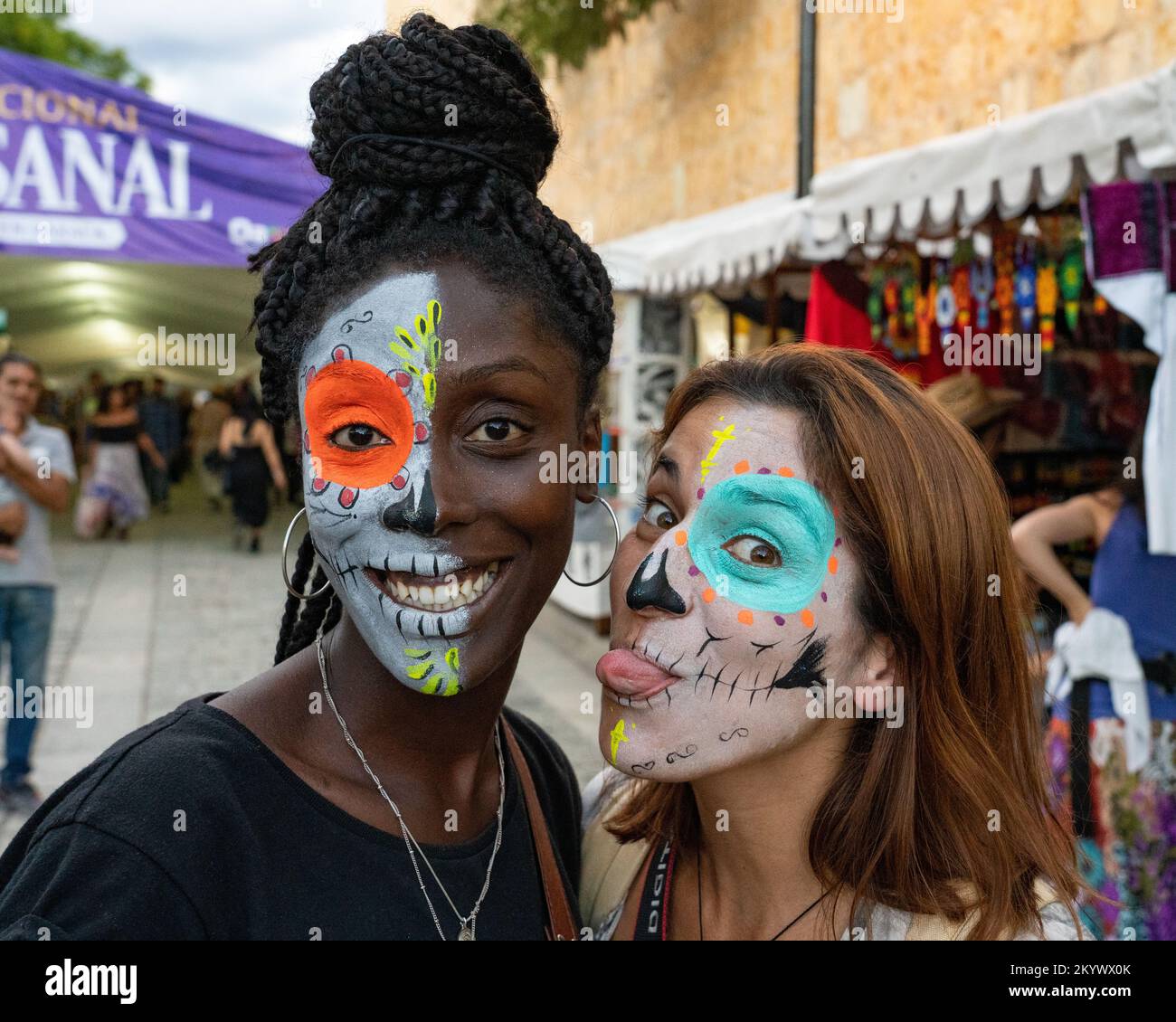 two-international-tourists-with-their-faces-painted-for-the-day-of-the