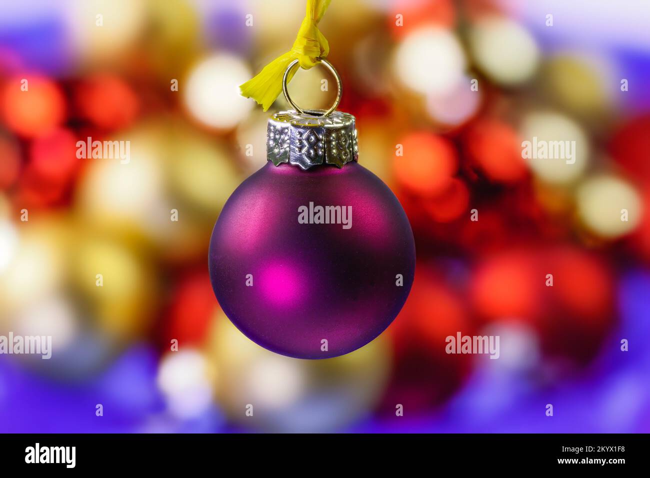 Closeup of an hanging purple christmas ornament Stock Photo