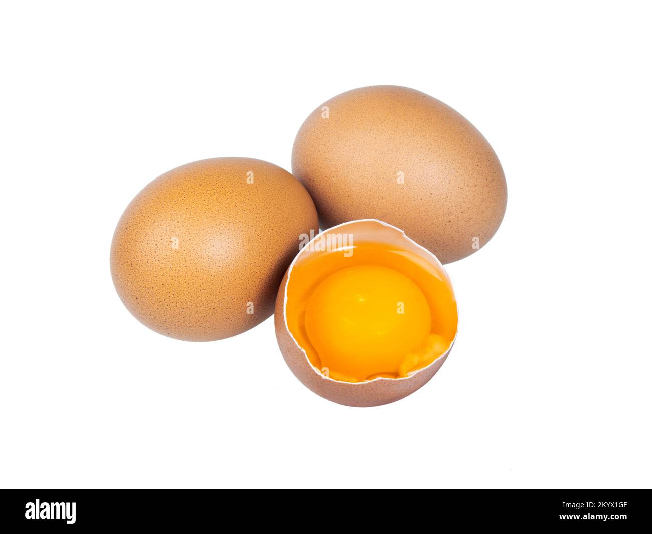 Eggs whole  and one broken isolated on a white background. Stock Photo