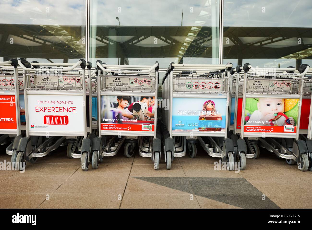 HONG KONG DECEMBER 24, 2015 baggage trolleys near entrance to Hong