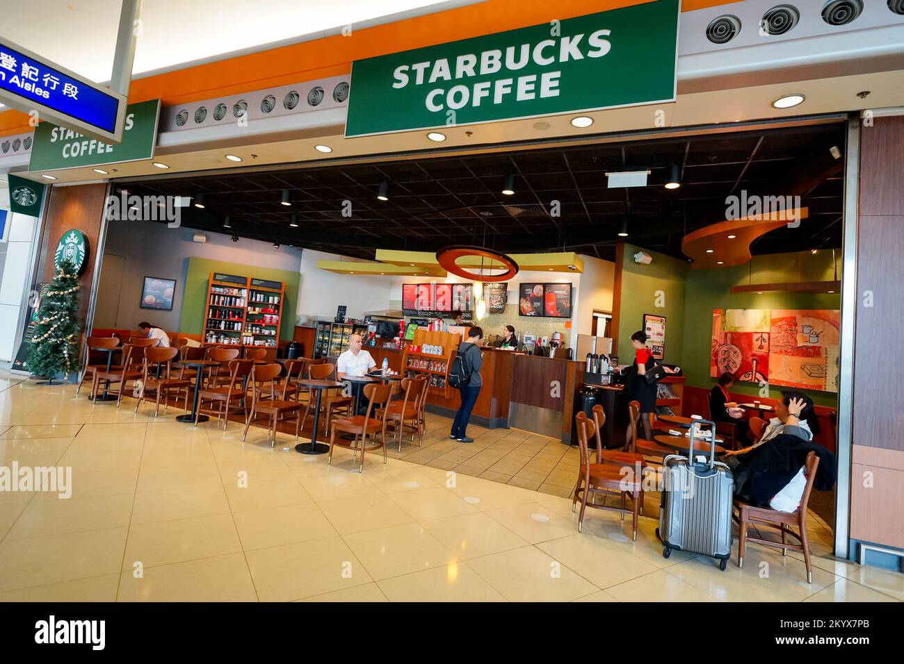 HONG KONG - DECEMBER 24, 2015: interior of Starbucks cafe. Starbucks Corporation is an American global coffee company and coffeehouse chain based in S Stock Photo