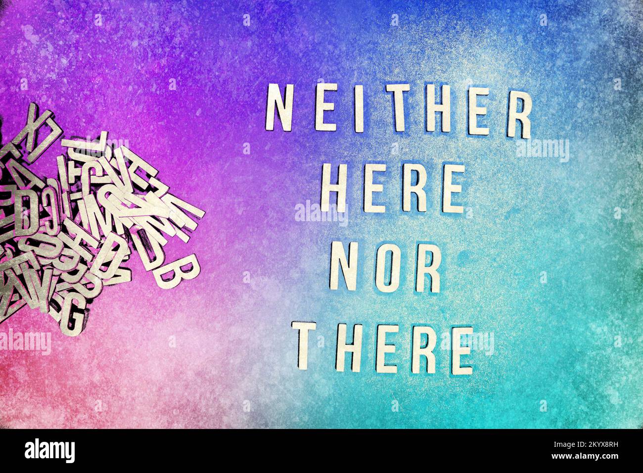 NEITHER HERE NOR THERE in wooden English language capital letters