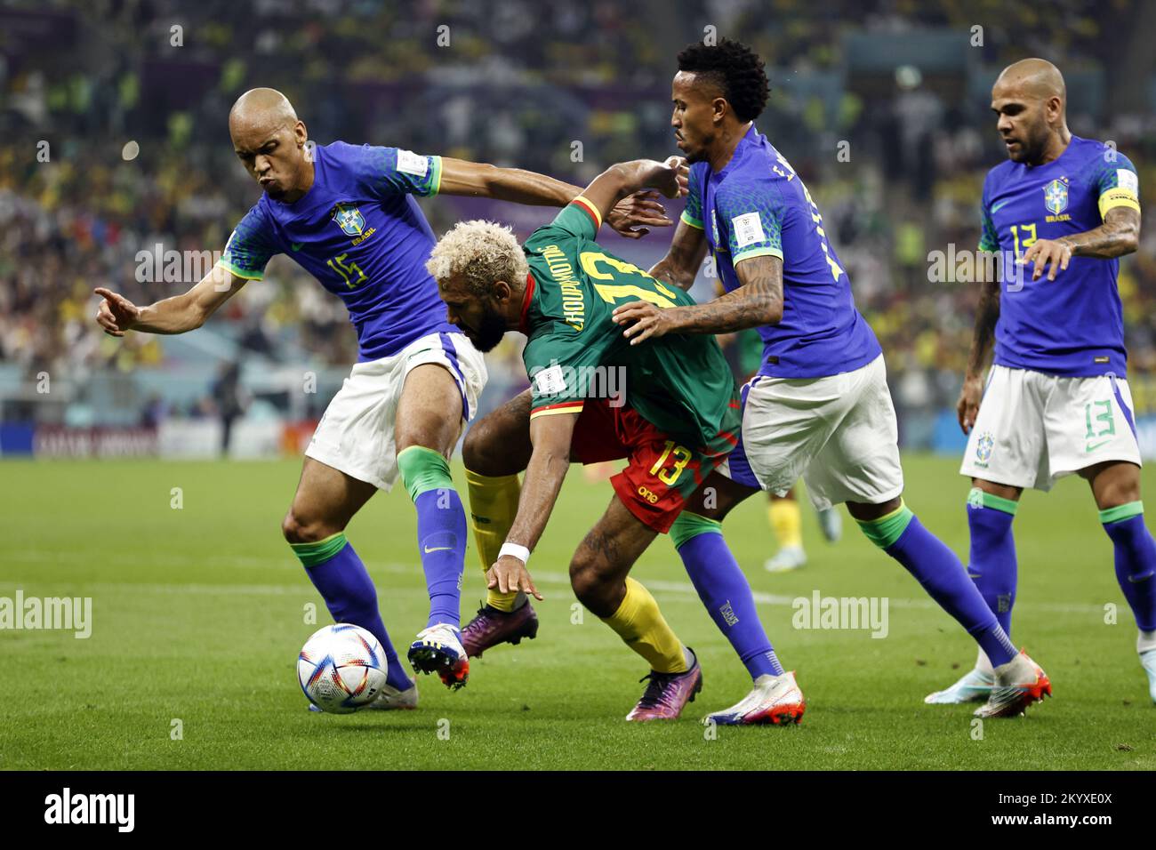 Qatar. 02nd Dec, 2022. LUSAIL CITY - (l-r) Fabinho of Brazil, Eric Maxim Choupo-Moting of Cameroon, Eder Militao of Brazil, Dani Alves of Brazil during the FIFA World Cup Qatar 2022 group G match between Cameroon and Brazil at Lusail Stadium on December 2, 2022 in Lusail City, Qatar. AP | Dutch Height | MAURICE OF STONE Credit: ANP/Alamy Live News Stock Photo