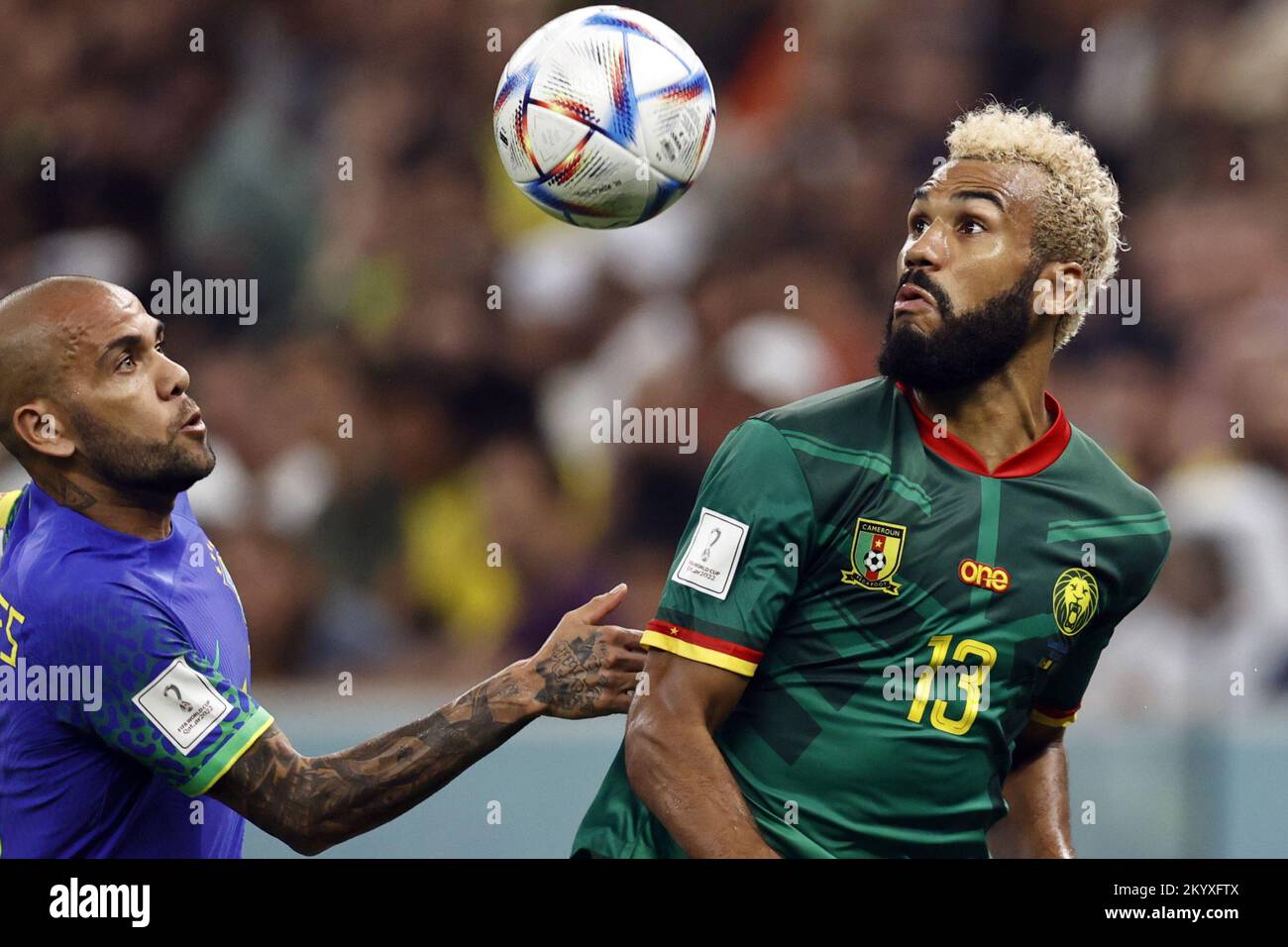 Qatar. 02nd Dec, 2022. LUSAIL CITY - (l-r) Dani Alves of Brazil, Eric Maxim Choupo-Moting of Cameroon during the FIFA World Cup Qatar 2022 group G match between Cameroon and Brazil at Lusail Stadium on December 2, 2022 in Lusail City, Qatar. AP | Dutch Height | MAURICE OF STONE Credit: ANP/Alamy Live News Stock Photo