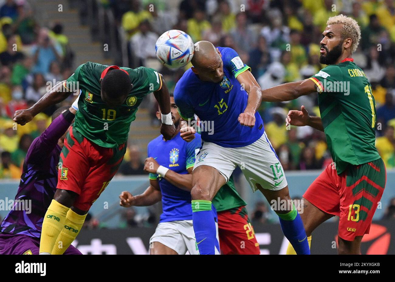 Lusail, Qatar. 2nd Dec, 2022. Fabinho (C) of Brazil vies with Collins Fai (L) of Cameroon during their Group G match at the 2022 FIFA World Cup at Lusail Stadium in Lusail, Qatar, Dec. 2, 2022. Credit: Chen Cheng/Xinhua/Alamy Live News Stock Photo