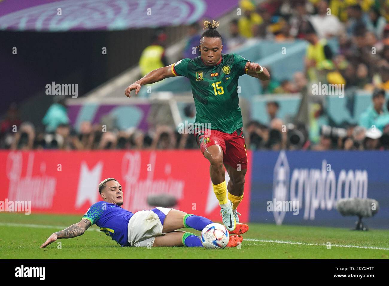 Cameroon's Pierre Kunde gets past Brazil's Antony during the FIFA World Cup  Group G match at the Lusail Stadium in Lusail, Qatar. Picture date: Friday  December 2, 2022 Stock Photo - Alamy