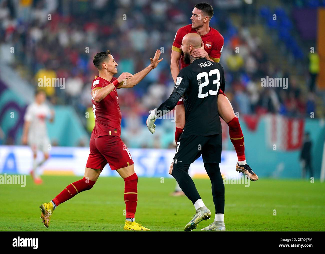 Serbia's Dusan Vlahovic (top right) celebrates with goalkeeper Vanja Milinkovic-Savic after scoring their side's second goal of the game during the FIFA World Cup Group G match at Stadium 974 in Doha, Qatar. Picture date: Friday December 2, 2022. Stock Photo
