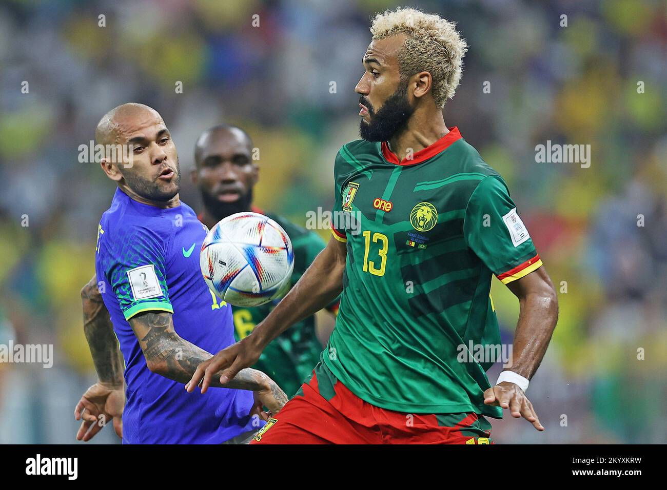 Lusail Iconic Stadium, Lusail, Qatar. 2nd Dec, 2022. FIFA World Cup Football, Cameroon versus Brazil; Eric Maxim Choupo-Moting dof Cameroon wins the challenge with Daniel Alves of Brasil Credit: Action Plus Sports/Alamy Live News Stock Photo