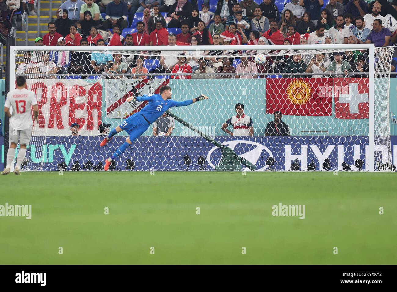 Doha, Qatar. 2nd Dec, 2022. Switzerland's goalkeeper Gregor Kobel (R) fails to save a goal by Aleksandar Mitrovic of Serbia during the Group G match between Serbia and Switzerland at the 2022 FIFA World Cup at Stadium 974 in Doha, Qatar, Dec. 2, 2022. Credit: Xu Zijian/Xinhua/Alamy Live News Stock Photo