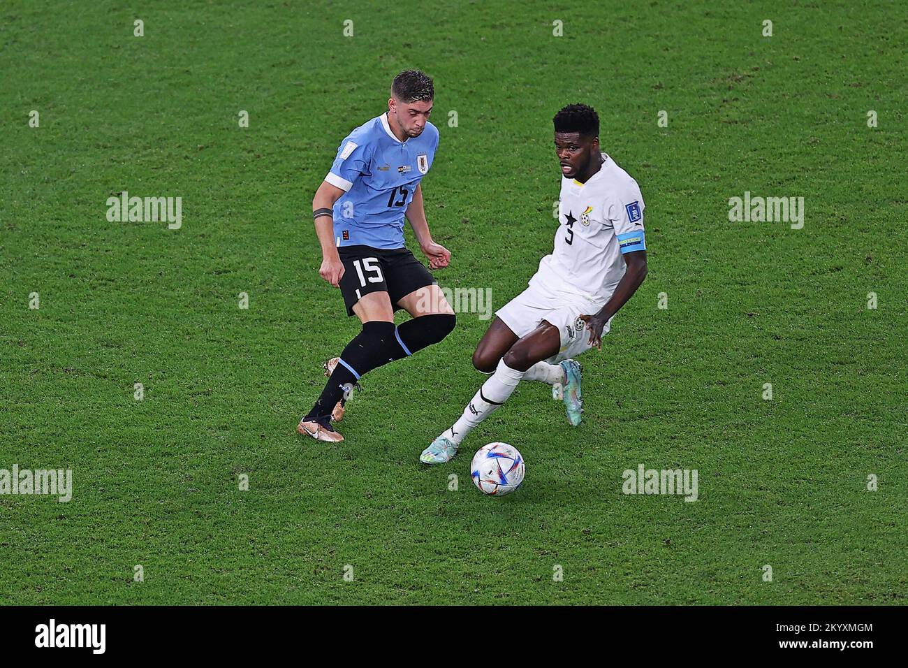 Doha, Qatar. 02nd Dec, 2022. Thomas Partey of Ghana competes with Federico Valverde of Uruguay, during the match between Ghana and Uruguay, for the 3rd round of Group H of the FIFA World Cup Qatar 2022, Al Janoub Stadium this Friday 02. 30761 (Heuler Andrey/SPP) Credit: SPP Sport Press Photo. /Alamy Live News Stock Photo