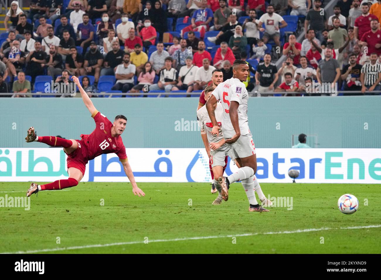 Doha, Qatar. 2nd Dec, 2022. Dusan Vlahovic (L) of Serbia scores during the Group G match between Serbia and Switzerland at the 2022 FIFA World Cup at Stadium 974 in Doha, Qatar, Dec. 2, 2022. Credit: Li Gang/Xinhua/Alamy Live News Stock Photo