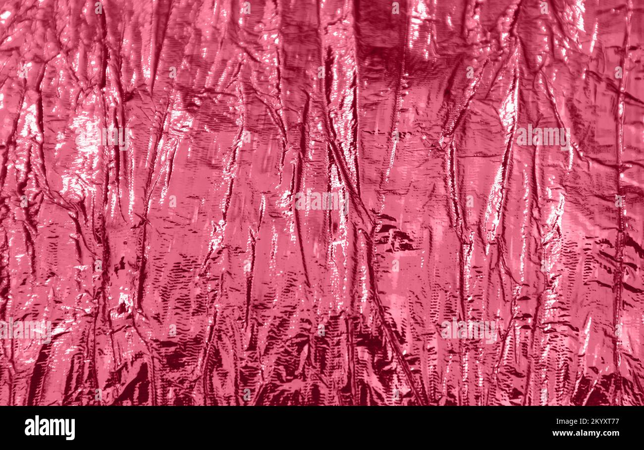Holographic abstract magenta textured background. Stock Photo