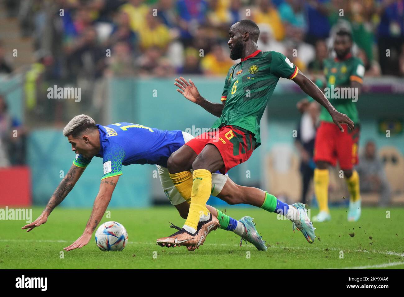 Bruno Guimarães of Brazil and Nicolas Moumi Ngamaleu of Cameroon during the FIFA World Cup Qatar 2022 match, Group G, between Cameroon and Brazil played at Lusail Stadium on Dec 2, 2022 in Lusail, Qatar. (Photo by Bagu Blanco / PRESSIN) Stock Photo