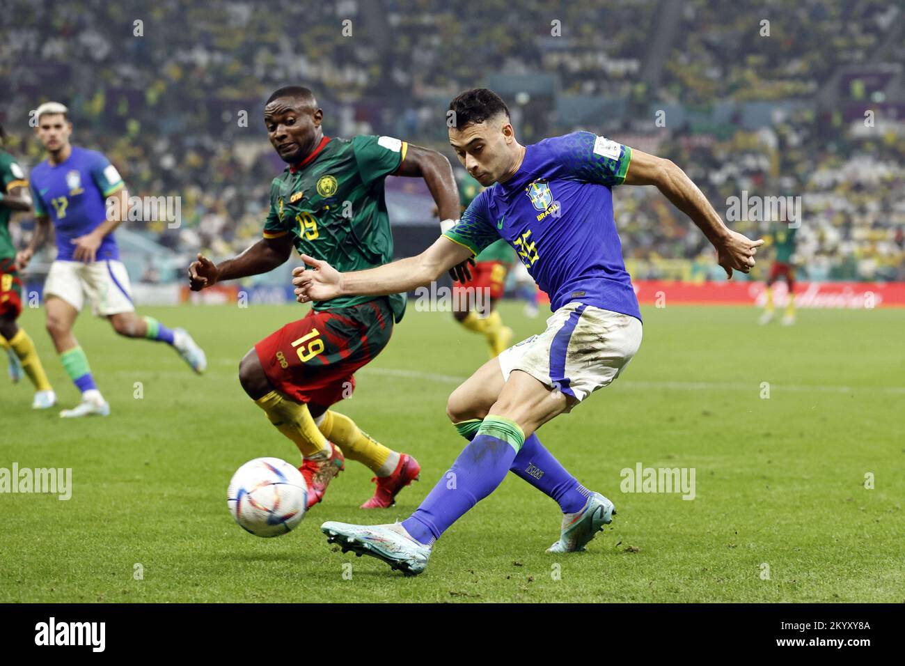 Qatar. 02nd Dec, 2022. LUSAIL CITY - (l-r) Collins Fai of Cameroon, Gabriel Martinelli of Brazil during the FIFA World Cup Qatar 2022 group G match between Cameroon and Brazil at Lusail Stadium on December 2, 2022 in Lusail City, Qatar. AP | Dutch Height | MAURICE OF STONE Credit: ANP/Alamy Live News Stock Photo