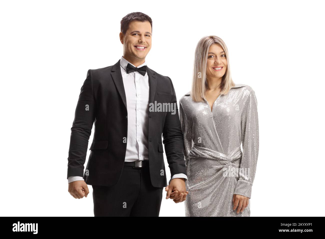 Elegant young couple holding hands isolated on white background Stock ...