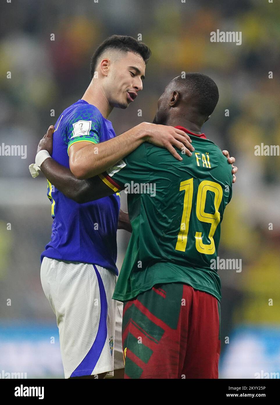 Brazil's Gabriel Martinelli (left) and Cameroon's Collins Fai after the final whistle during the FIFA World Cup Group G match at the Lusail Stadium in Lusail, Qatar. Picture date: Friday December 2, 2022. Stock Photo