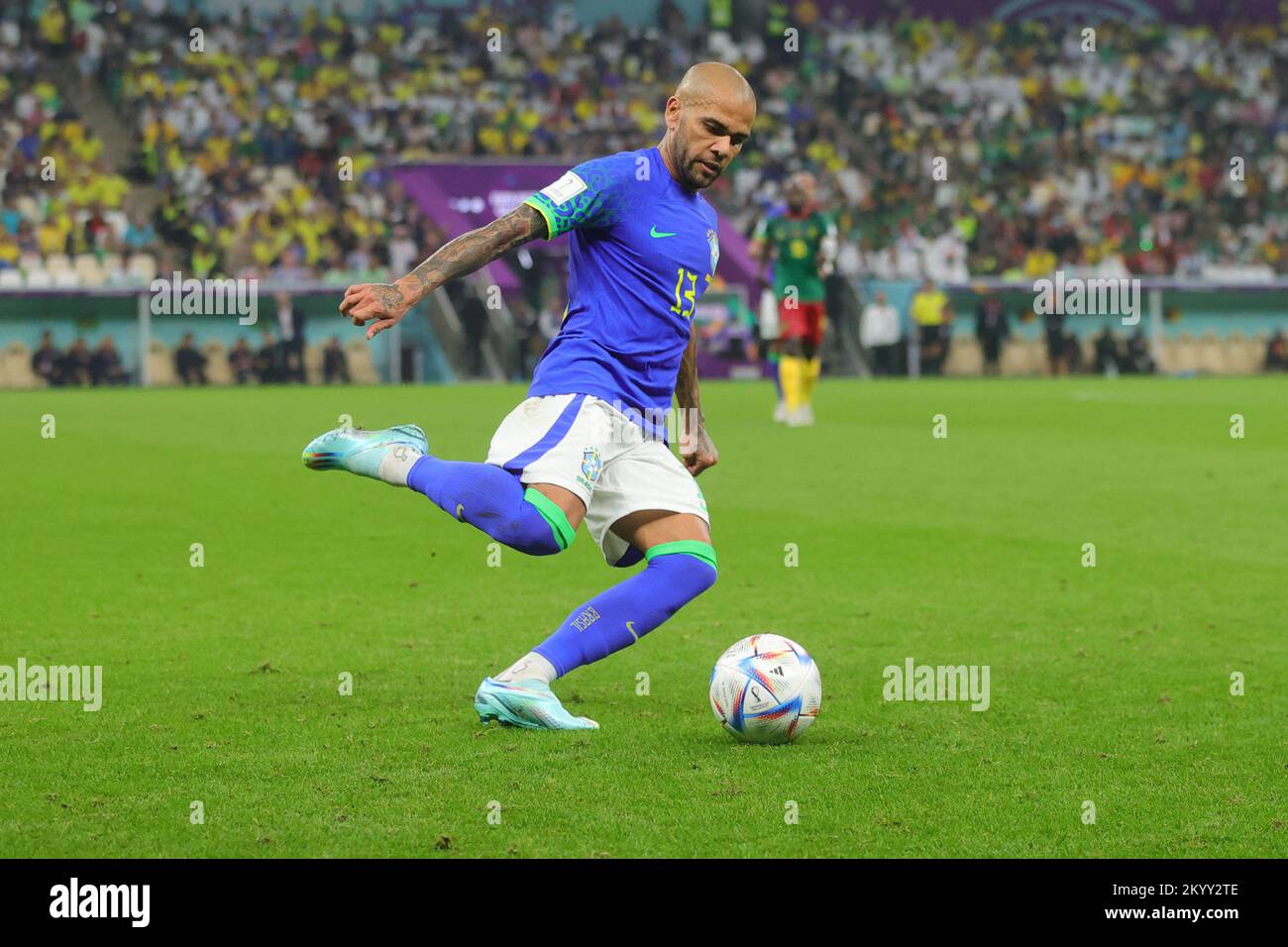 Lusail, Qatar. 02nd Dec, 2022. Dani Alves of Brazil crosses the ball during the FIFA World Cup Qatar 2022 Group G match between Cameroon and Brazil at Lusail Stadium, Lusail, Qatar on 2 December 2022. Photo by Peter Dovgan. Editorial use only, license required for commercial use. No use in betting, games or a single club/league/player publications. Credit: UK Sports Pics Ltd/Alamy Live News Stock Photo