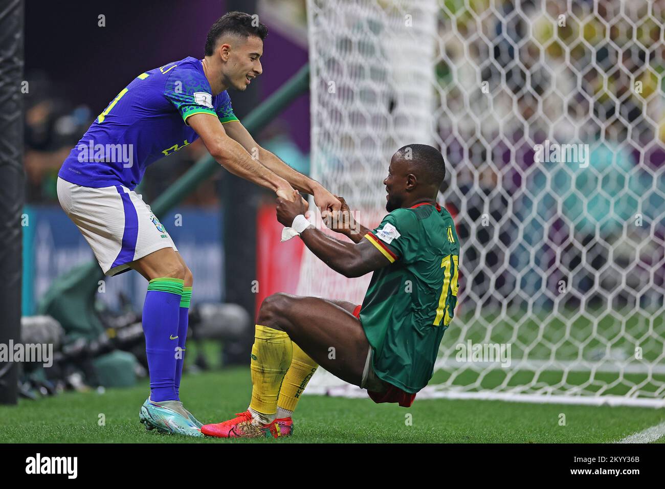Doha, Qatar. 02nd Dec, 2022. Collins Fai of Cameroon receives help from Gabriel Martinelli of Brazil, during the match between Cameroon and Brazil, for the 3rd round of Group G of the FIFA World Cup Qatar 2022, at Lusail Stadium, this Friday 02. 30761 (Heuler Andrey/SPP) Credit: SPP Sport Press Photo. /Alamy Live News Stock Photo