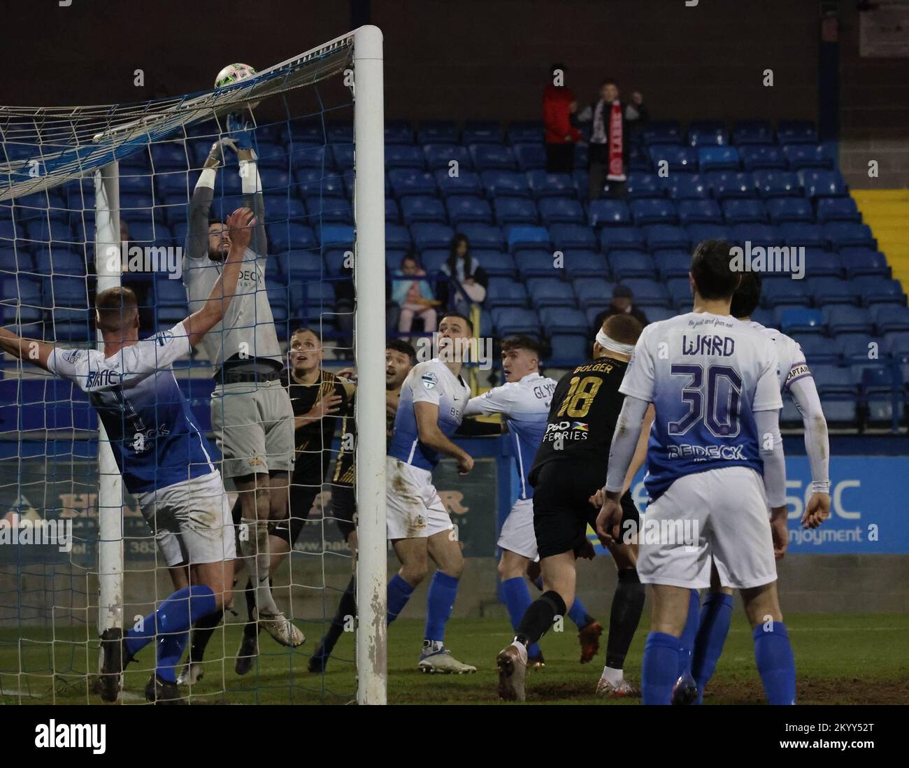 Mourneview Park, Lurgan, County Armagh, Northern Ireland, UK. 2 Dec 2022. Danske Bank Premiership – Glenavon v Larne Action from tonight's game at Mourneview Park (Glenavon in blue). Glenavon goalkeeper Rory Brown pushes the ball up onto the crossbar in the second-half. Credit: CAZIMB/Alamy Live News. Stock Photo