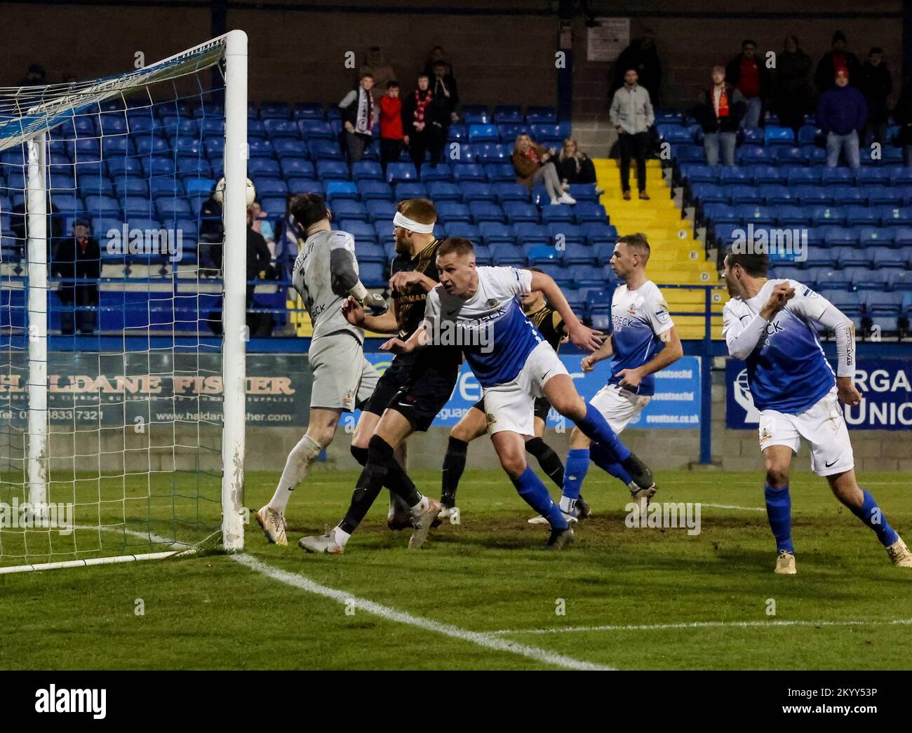 Mourneview Park, Lurgan, County Armagh, Northern Ireland, UK. 2 Dec 2022. Danske Bank Premiership – Glenavon v Larne Action from tonight's game at Mourneview Park (Glenavon in blue). An own goal from Gleavon's Sean Ward (right) was the difference between the teams. Credit: CAZIMB/Alamy Live News. Stock Photo
