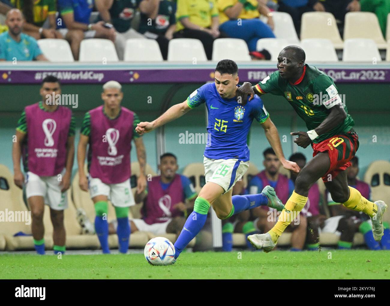 Lusail, Qatar. 2nd Dec, 2022. Gabriel Martinelli of Brazil vies with Vincent Aboubakar of Cameroon during their Group G match at the 2022 FIFA World Cup at Lusail Stadium in Lusail, Qatar, Dec. 2, 2022. Credit: Li Ga/Xinhua/Alamy Live News Stock Photo