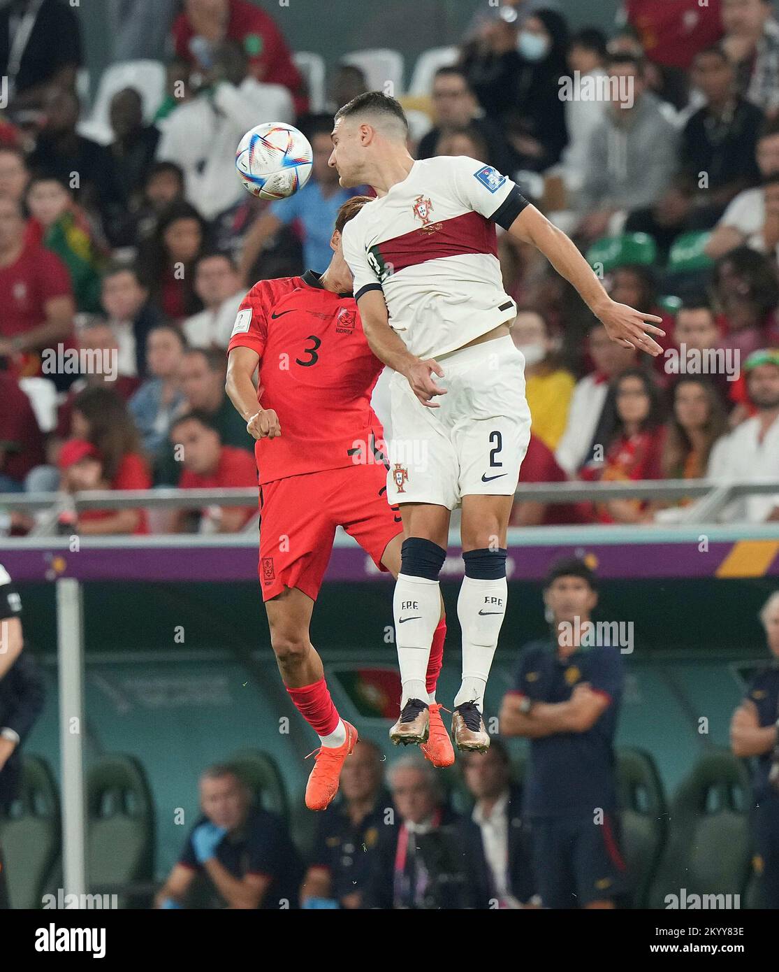 12/02/2022, Education City Stadium, Doha, QAT, World Cup FIFA 2022, Group H, South Korea vs Portugal, in the picture South Korea's defender Kim Jin-su, Portugal's defender Diogo Dalot Stock Photo