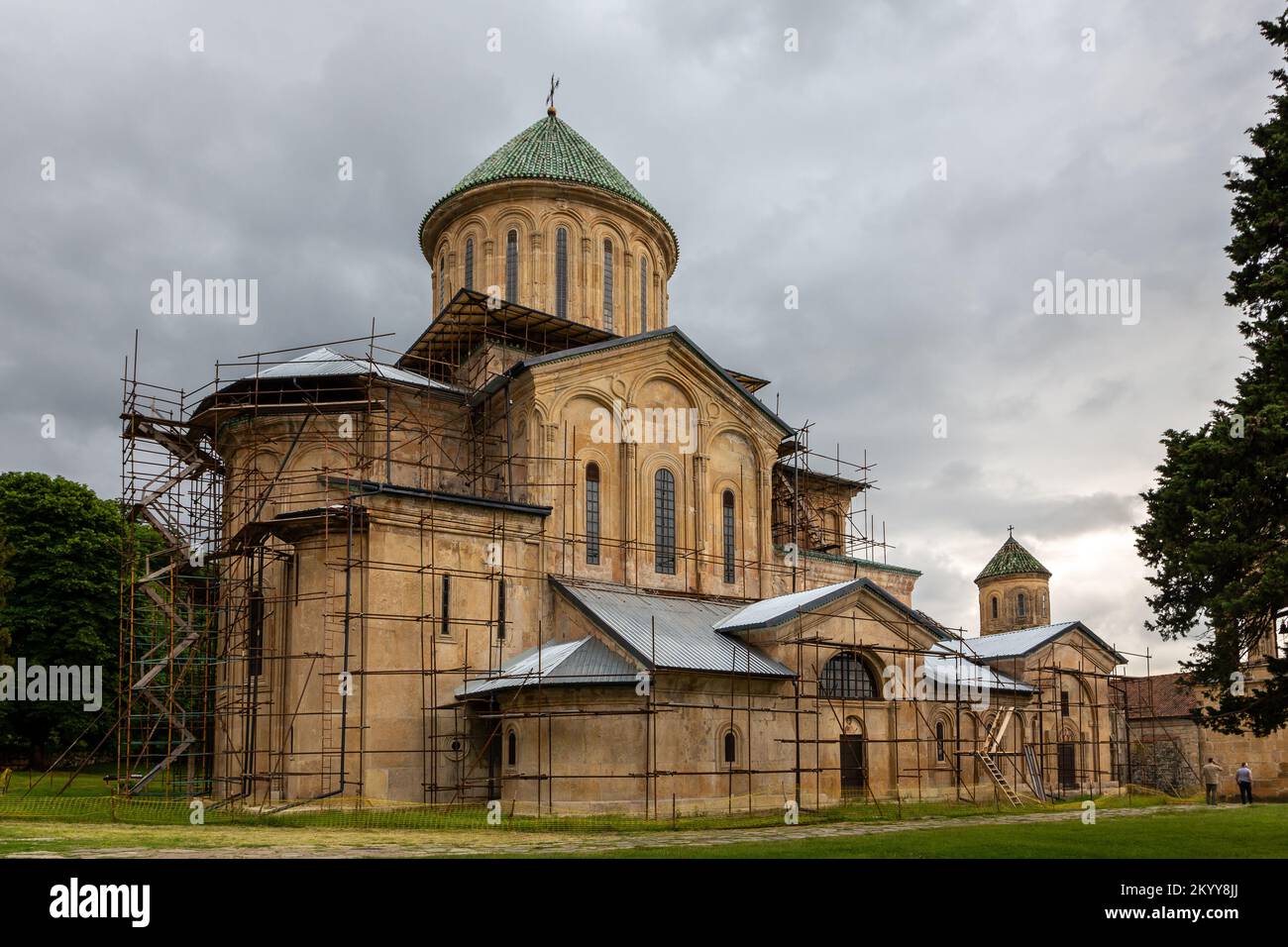 Gelati Monastery, medieval monastic complex near Kutaisi, Georgia founded by King David IV, view with scaffolding during restoration process. Stock Photo