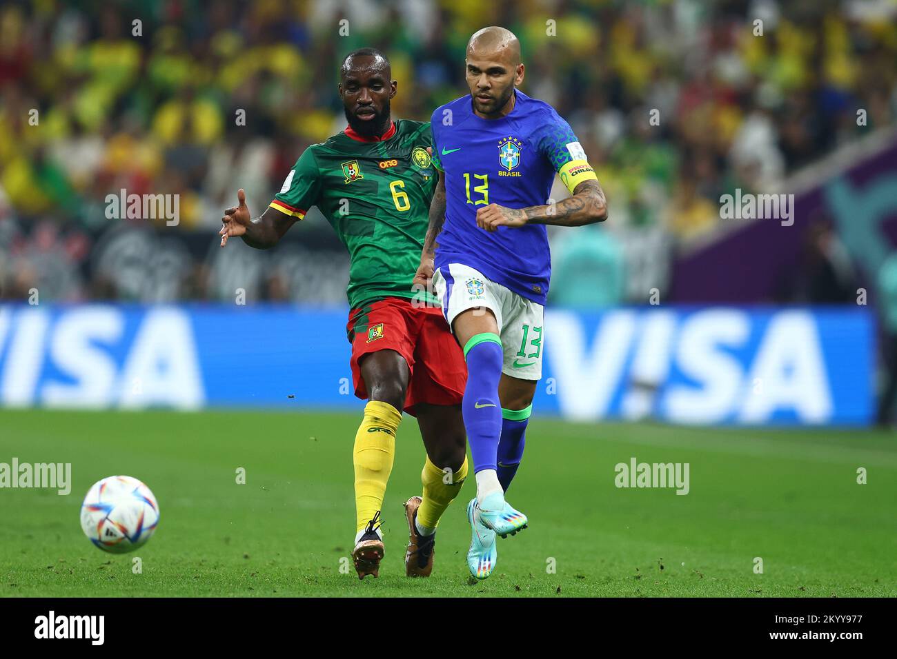 Doha, Qatar. 02nd Dec, 2022. Nicolas Moumi Ngamaleu (L) of Cameroon in action with Dani Alves of Brazil during the 2022 FIFA World Cup Group G match at Lusail Stadium in Doha, Qatar on December 02, 2022. Photo by Chris Brunskill/UPI Credit: UPI/Alamy Live News Stock Photo