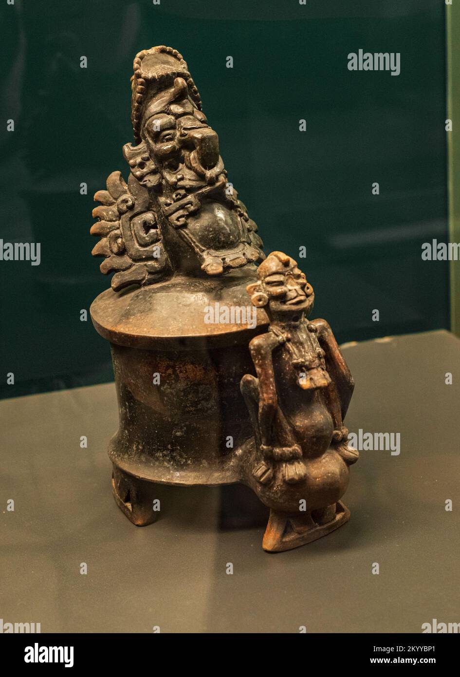 Maya ceramic container depicting a bird and a monkey, found as part of an offering in Calakmul, Campeche.  Early classic period. Stock Photo