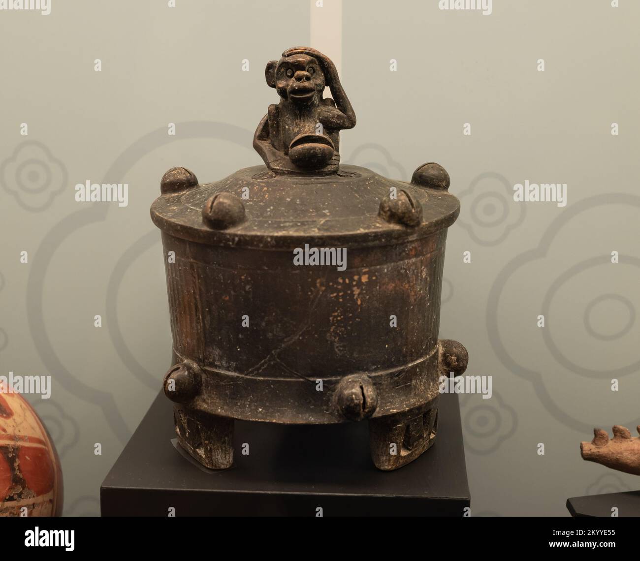 Ceramic Mayan pot with a monkey figure on top, from the early classic period. Campeche, Mexico. Stock Photo