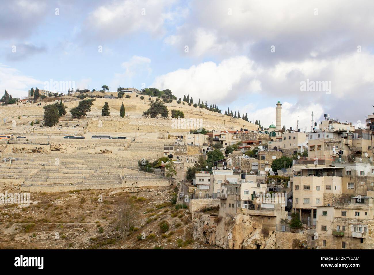 8 November 2022 A view of the tombs on the Mount of Olives together with the crowded local housing seen from the terrace near Hezekiah's Tunnel in Jer Stock Photo