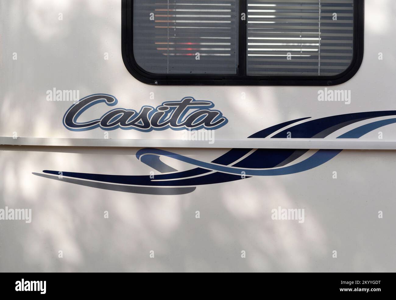 A Casita travel trailer parked in a campground in New Mexico. The small