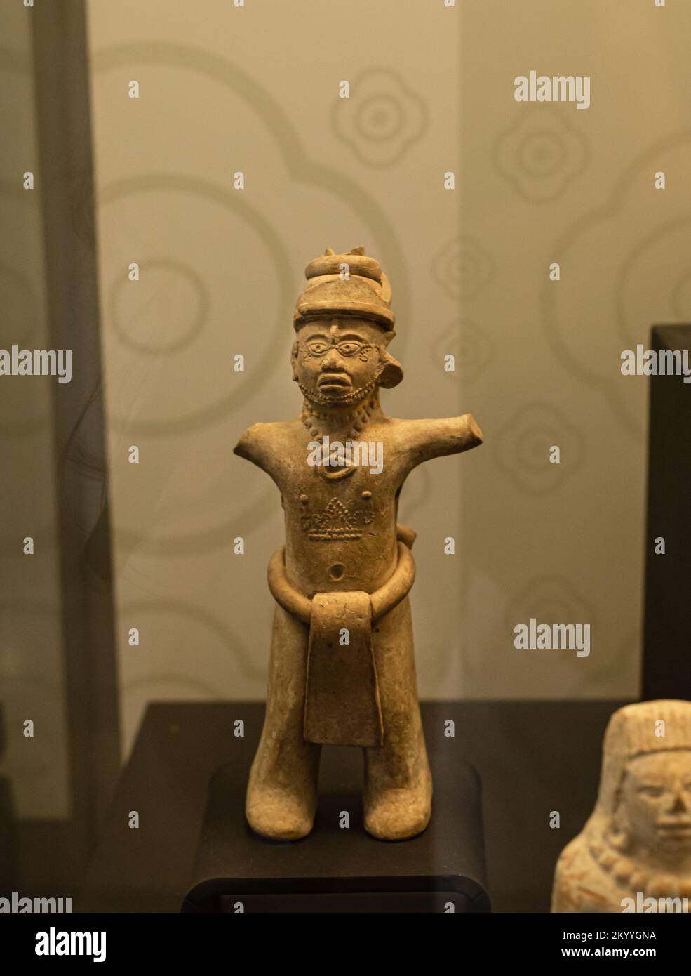 Mayan ceramic figure of a young man wearing a collar and scarification his chest. Late Classic Maya, A.D. 600-900.  Campeche, Mexico Stock Photo