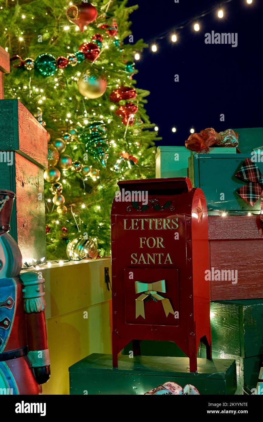 Festive lights and displays delight onlookers at a Christmas village