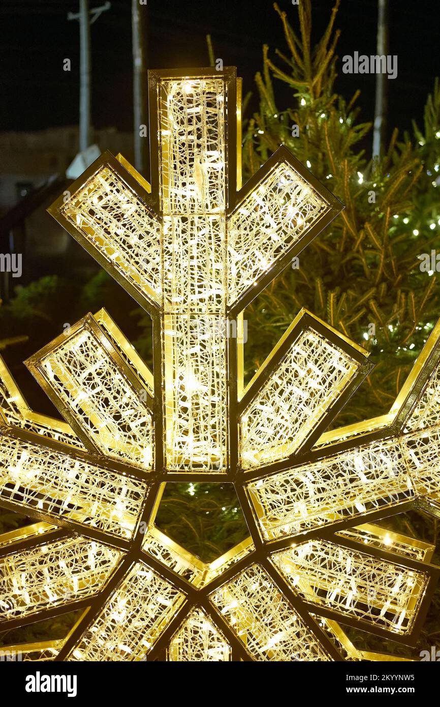 Festive lights and displays delight onlookers at a Christmas village