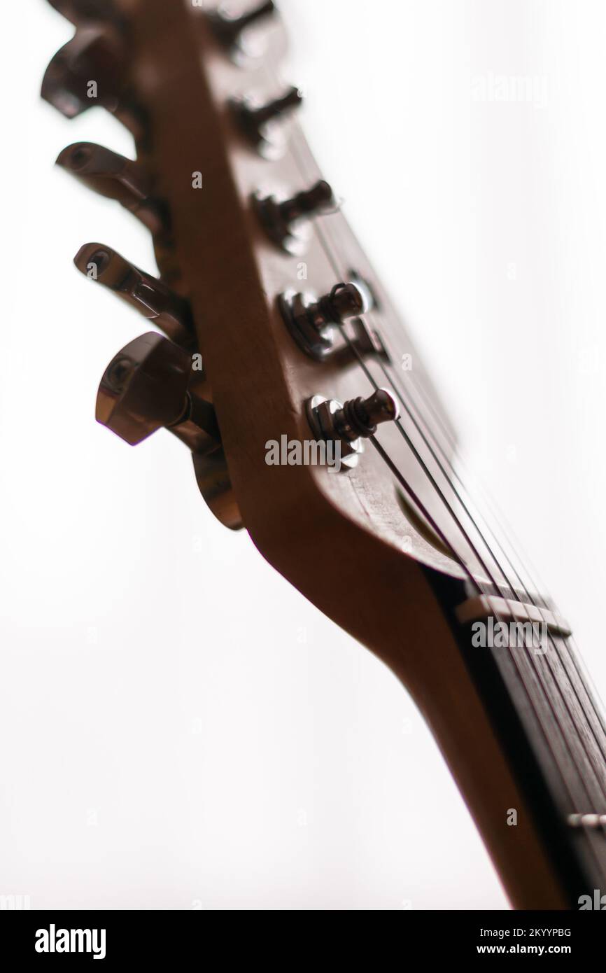 Fine art shot of an electric guitar on a very bright background. Stock Photo