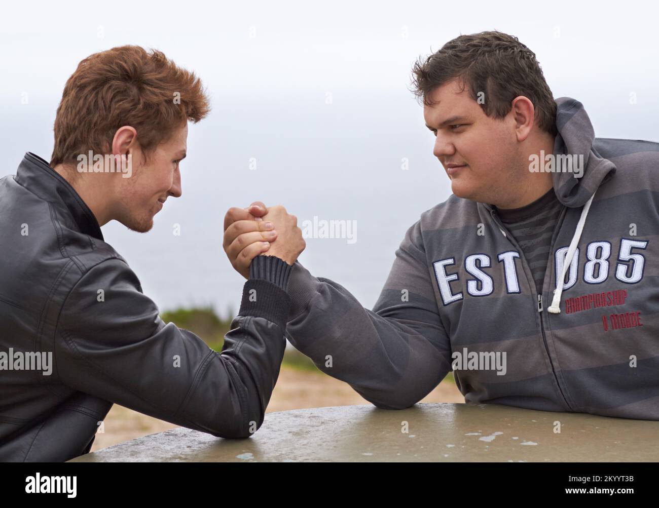 You havent got a chance. Two friends having an arm wrestling