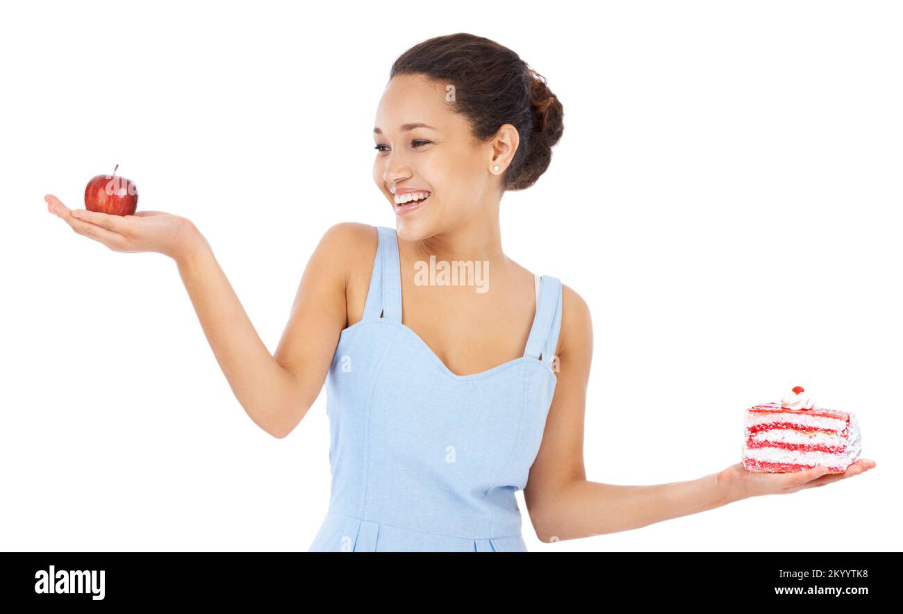 Its an easy choice...healthy always wins. Young woman smiling while ...